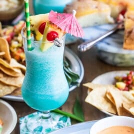 A table setting for a tropical party.