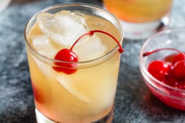 A whiskey sour in a rocks glass.
