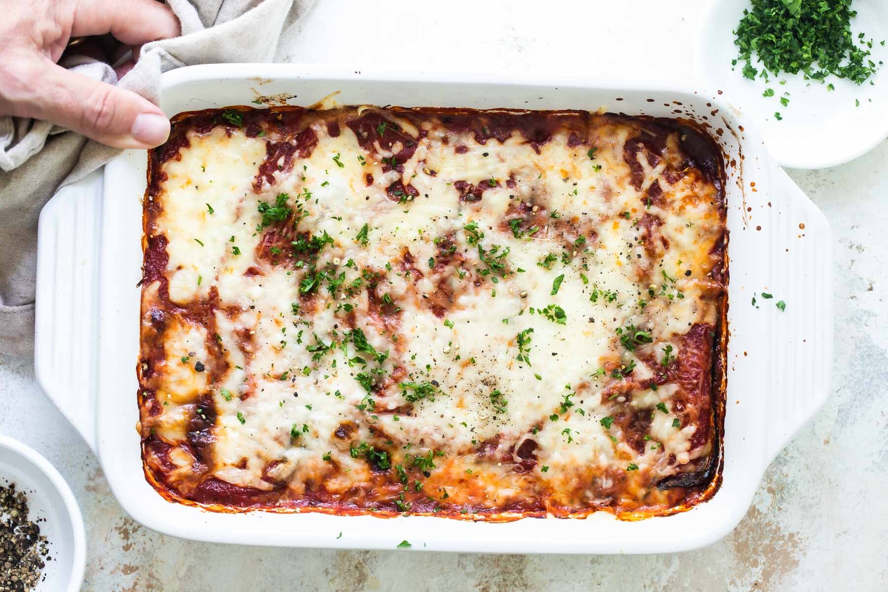 A baking dish of Zucchini Parmesan.